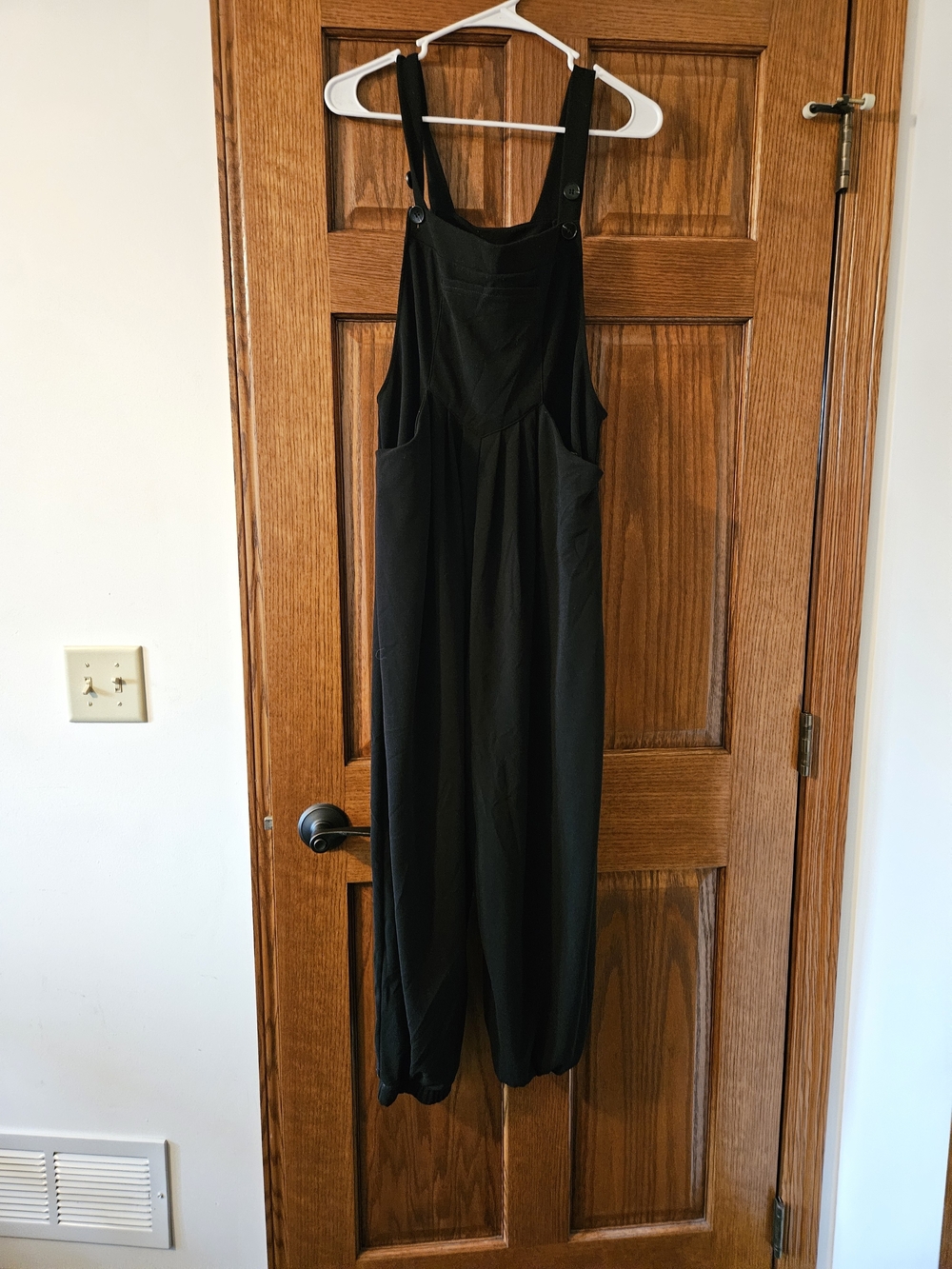 HALARA Black Relaxed Jumpsuit with Adjustable Straps